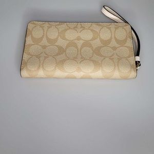 Coach tan and gold wallet